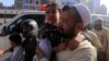 Children who complained of health issues after being administered polio vaccines are rushed to a hospital for treatment in Peshawar, Pakistan, on April 22.