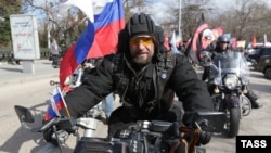 Aleksandr Zaldostanov, leader of the Night Wolves biker group, takes part in a commemoration ceremony for soldiers killed during WWII at the World War II memorial in Sevastopol, Crimea, on March 17.