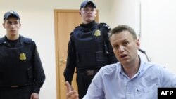 Russian opposition leader Aleksei Navalny after a Moscow court hearing on June 12