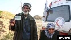 Mohammad Fadhl Akram, 73, and his 62-year-old wife, Saghran Bibi, were transferred from the eastern Ghouta town of Douma to Damascus.