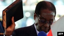 претседателот на Зимбабве Роберт Мугабе 