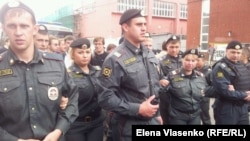 Russian police gather outside the Investigative Committee building in Moscow on June 16.