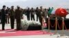 The coffin of former Iraqi president Jalal Talabani arrives at Sulaimaniya Airport on October 6. 