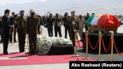 The coffin of former Iraqi president Jalal Talabani arrives at Sulaimaniya Airport on October 6. 