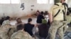 Russian-Speaking Militants Prepare To Fight Assad In Hama