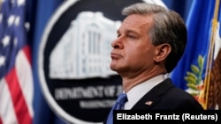FBI Director Christopher Wray said that while Russia had for years been trying to infiltrate U.S. companies to steal information, its activity paled in comparison to that of China.