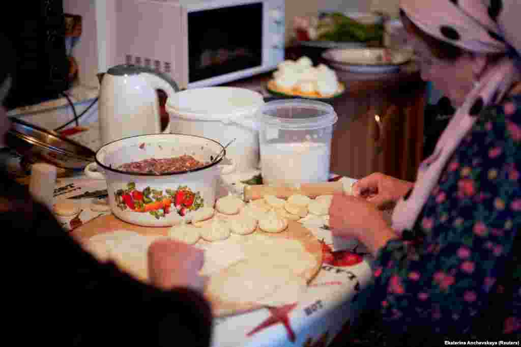 Pankisi women prepare kinkhali, a traditional Georgian dumpling dish. Photographer Anchevskaya told RFE/RL there are an increasing number of Saudi and other Arab tourists now staying in the gorge. “They come because it’s cheap, and also because of the Muslim culture -- they feel comfortable.”