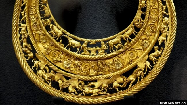 A golden Scythian pectoral, or breastplate, is seen on exhibit in Kyiv in 2021.