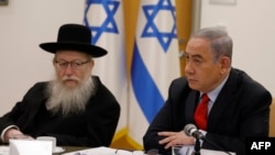خاحام یعقوب لیتزمن (چپ) همراه با بنیامین نتانیاهو