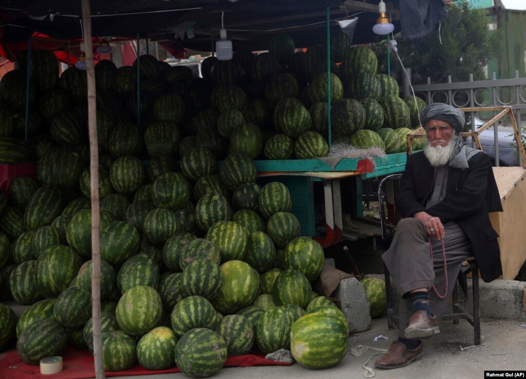 An Afghan street vendor sells watermelons during Ramadan in Kabul.