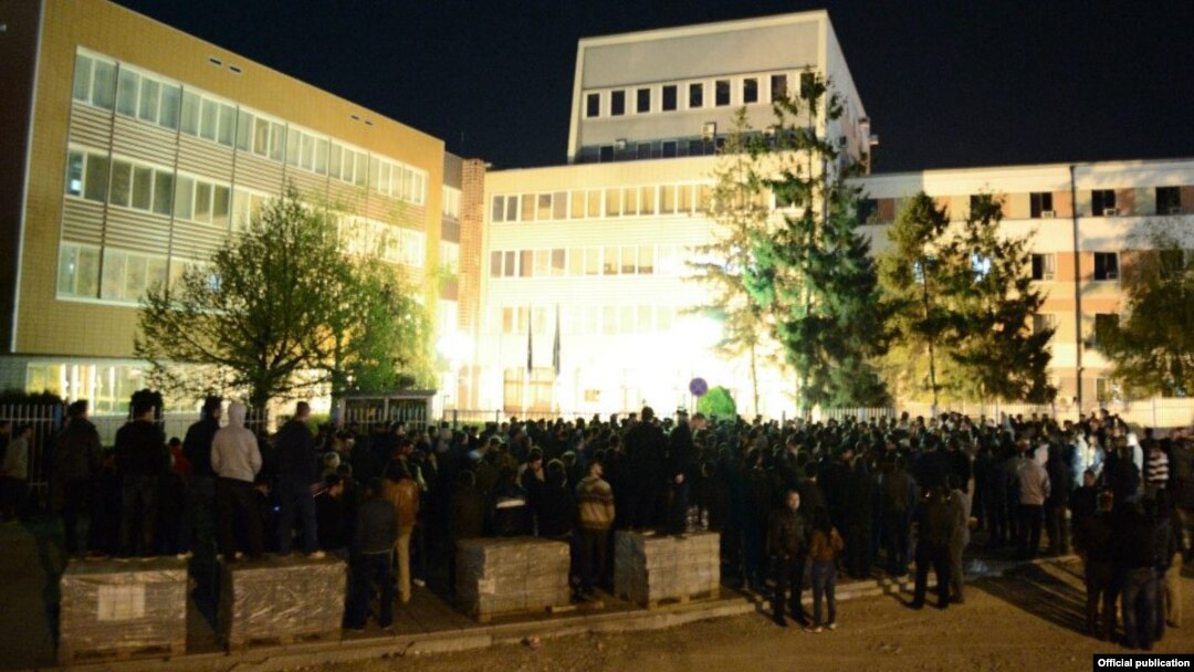 Protesters outside the Kosovo Parliament as lawmakers voted on the EU-mediated deal with Belgrade late on April 21.