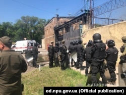 Inmates were apparently protesting over a series of searches by prison guards.