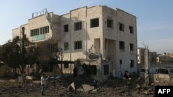 Разрушенное здание в городе Аазаз