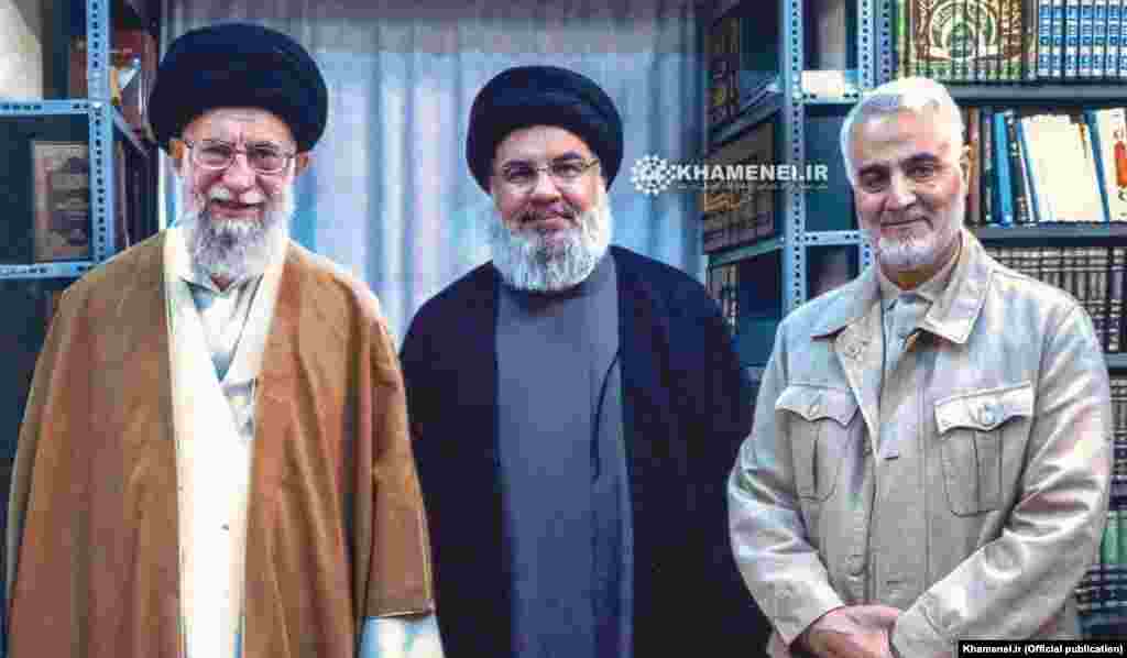 Soleimani appearing with Hizballah chief Hassan Nasrallah and Iranian Supreme Leader Ayatollah Ali Khamenei (left). Soleimani helped Iran strengthen its ties with Hizballah in Lebanon.&nbsp;Soleimani said he advised Hizballah during the 34-day war with Israel in 2006. More than 1,200 Lebanese and 160 Israelis were killed in the conflict.
