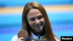 Аляксандра Герасіменя з алімпійскім мэдалём. 2016 год