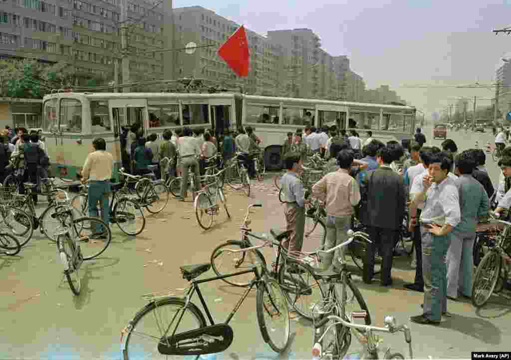 Buses are used by sympathizers to Beijing university students occupying Tiananmen Square to secure the city from government troops, May 22, 1989. Streets into and out of the city have been turned into obstacle courses. (AP Photo/Mark Avery)