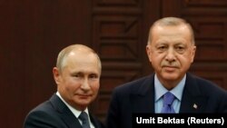 рускиот претседател Владимир Путин и турскиот претседател Реџеп Таип Ердоган