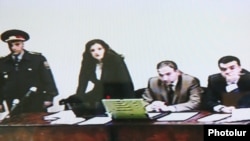 (Poor quality image) The trial of opposition activist Nikol Pashinian (second from right) started in Yerevan on October 20.