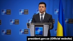 Ukrainian President Volodymyr Zelenskiy during a briefing at NATO headquarters in Brussels on December 16.