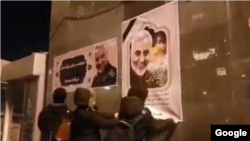 Protesters tearing Soleimani posters in Tabriz. January 12, 2020. 