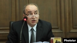 Armenia -- Robert Nazarian, the chairman of the Public Services Regulatory Commission, speaks in parliament, 17 June, 2014