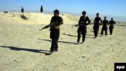 Pakistani security forces patrol along the Chaman border with Afghanistan.