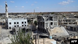 A general view of deserted streets and damaged buildings in the central Syrian town of Talbisah in Homs Province, which was targeted by Russian strikes on September 30.