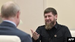 Ramzan Kadyrov (right) with Vladimir Putin (file photo)