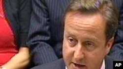 U.K. Prime Minister David Cameron speaks before the House of Commons in London on August 11.