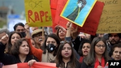 Activists of the Aurat (Woman) March shout slogans during a rally to mark International Women's Day in Islamabad on March 8.