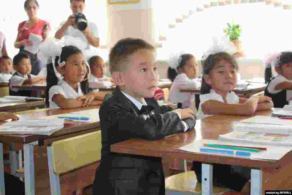 A first-grader begins his primary education at School No. 82 in the Ala-Too settlement outside of Bishkek, Kyrgyzstan.&nbsp;