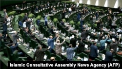 Iranian lawmakers chanting anti-U.S. slogans at the parliament in Tehran on May 9