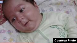 Пятимесячный таджикский младенец Умарали Назаров, который скончался в больнице Санкт-Петербурга после того, как его разлучили с матерью.