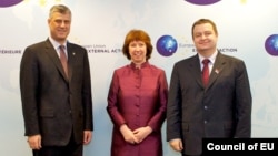 European Union foreign-policy chief Catherine Ashton met on February 19 with Kosovo's Hashim Thaci (left) and Serbia's Ivica Dacic (right).