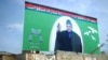 A large campaign poster for incumbent Afghan President Hamid Karzai