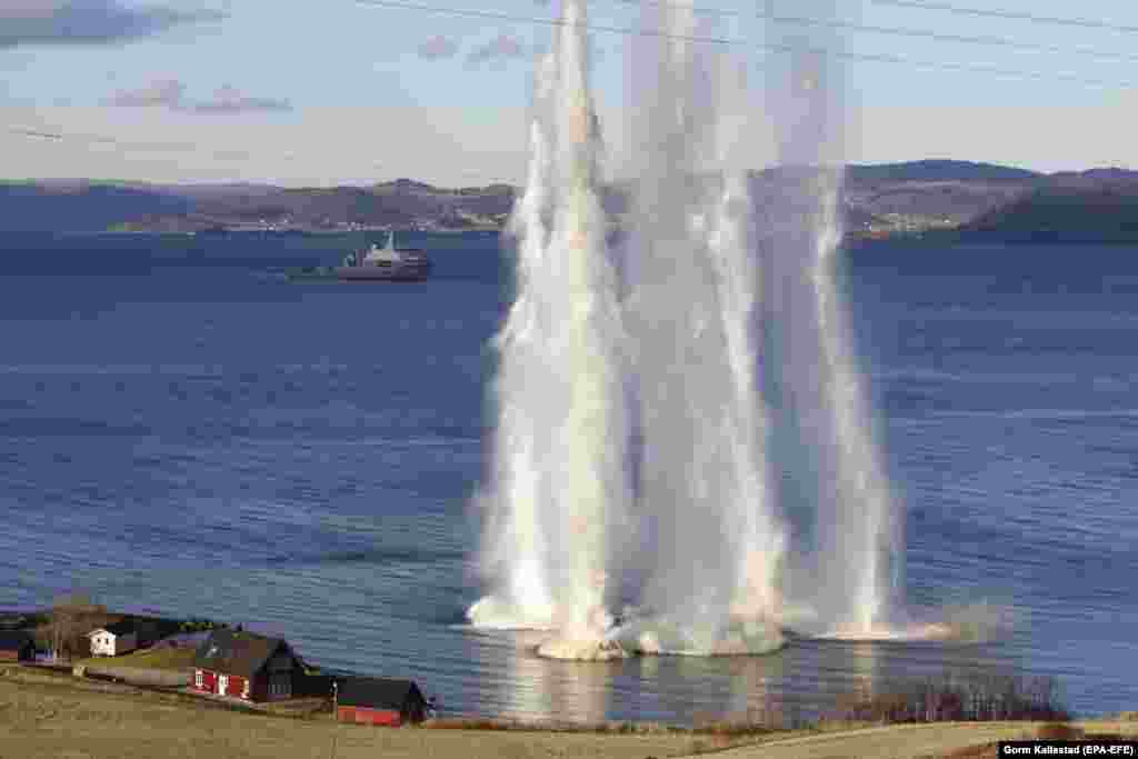 Munitions explode in water during the NATO-led Trident Juncture military exercise in Trondheim, Norway, on October 30. (epa-EFE/Gorm Kallestad)