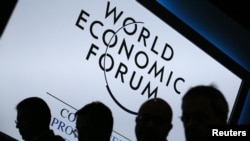 Switzerland -- Participants attend a session during the annual World Economic Forum (WEF) meeting in Davos, 23Jan2013