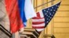 A Russian flag flies next to the U.S. Embassy in Moscow (file photo)