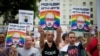 Участники акции протеста против преследования ЛГБТ в России, Лондон, 10 августа 2013 года