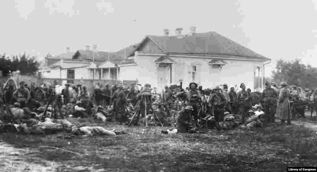White Army fighters wearing British Army helmets. While Western allies backed the Whites against the "foul baboonery" and violence of the communist Bolsheviks, the White Army engaged in its own "White Terror." Tens of thousands of Russians were killed by the Whites in often anti-Semitic violence.
