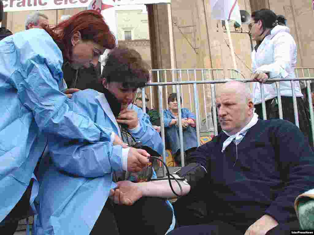 Georgia -- Parliamentarian Bidzina Gujabidze on a hunger strike outside the Parliament building in Tbilisi, 11Mar2008 - Lawmaker Bidzina Gujabidze, shown here undergoing a medical check, was among the Georgian hunger strikers. The strike ended after more than two weeks without winning any compromises from the ruling party.