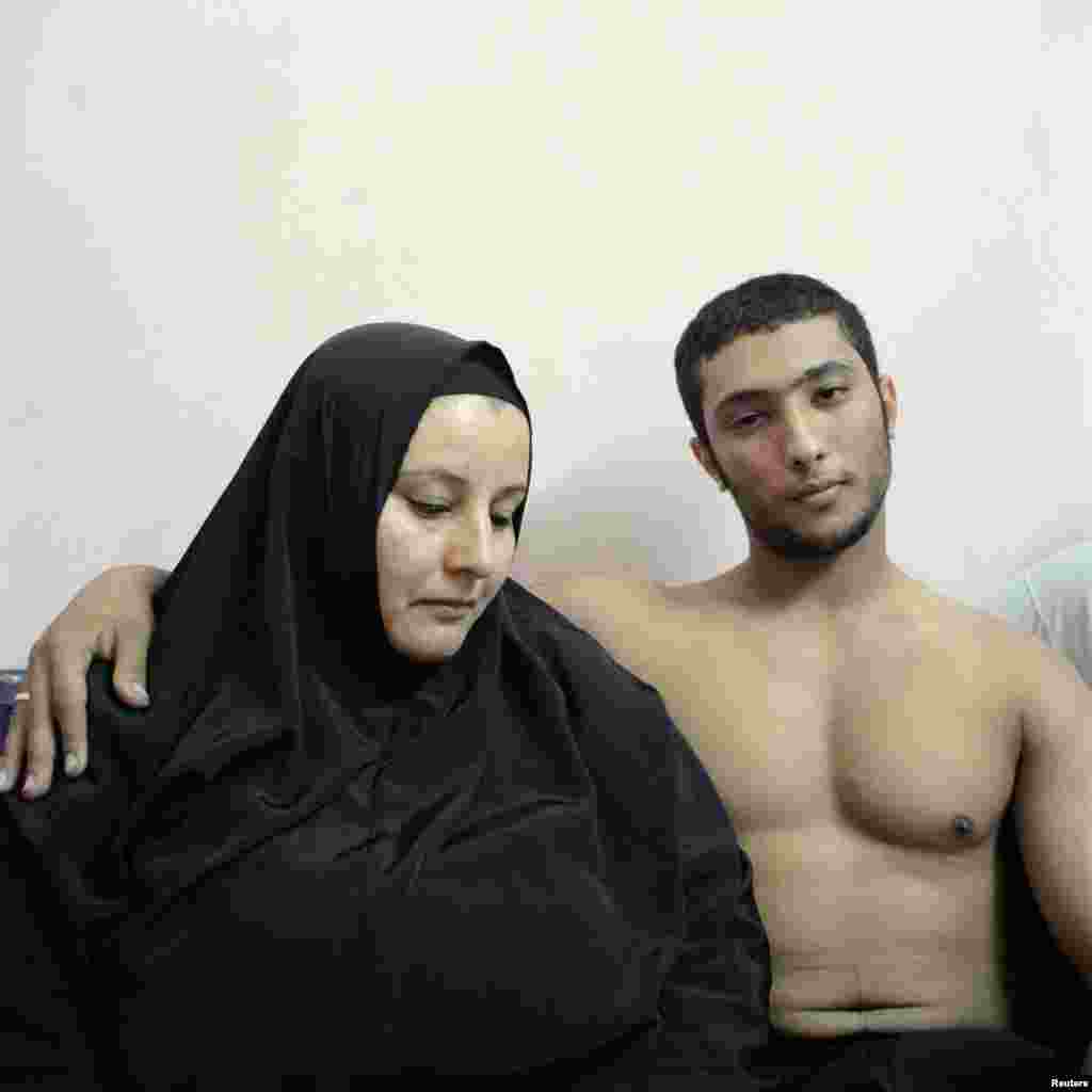 Denis Dailleux, a French photographer working for Agence Vu, won second prize in the People - Staged Portraits Stories category for a series including this one of Ali, a young Egyptian bodybuilder, posing with his mother in Cairo.