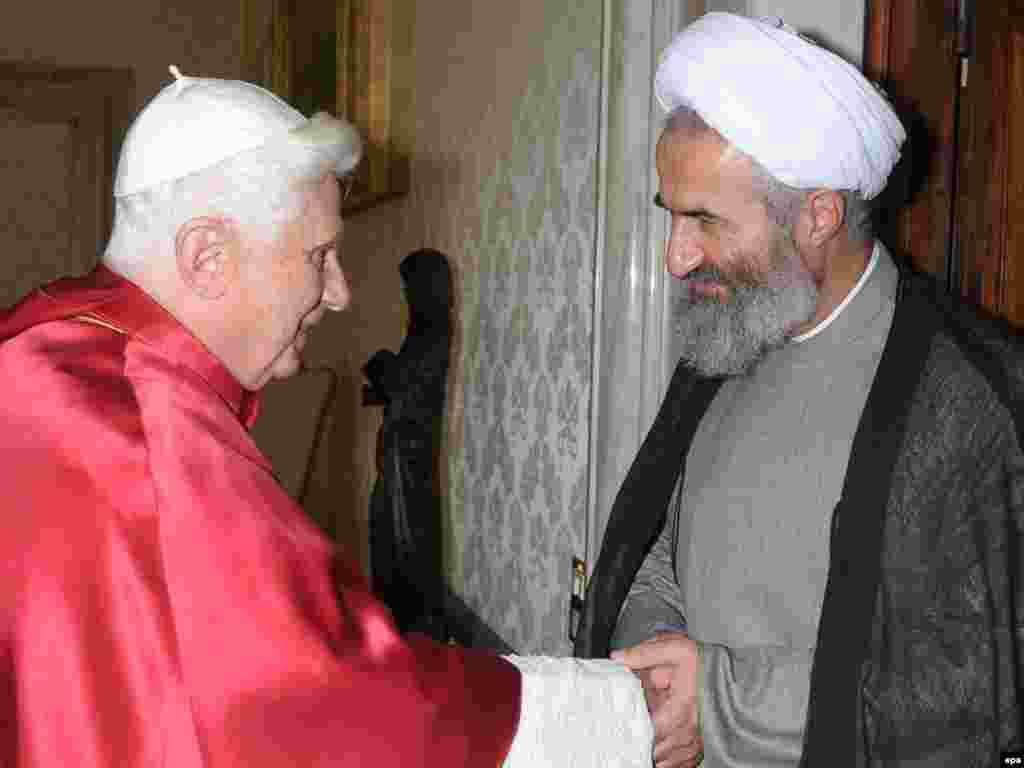 Pope Benedict greets the new ambassador of Iran, Ali Akbar Naseri, during their meeting in the private library in Vatican City in October 2009.