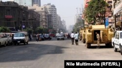 Военные автомобили на площади Рамзеса в Каире. 18 августа 2013 года.