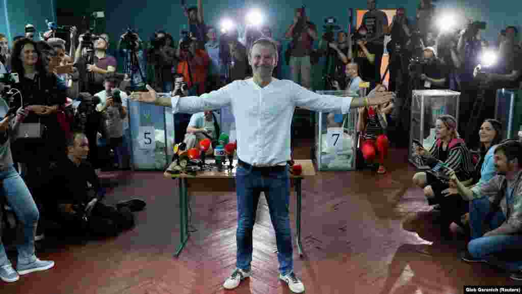Ukraine’s biggest pop-music star Svyatoslav Vakarchuk poses for a picture at a polling station in Kyiv. He leads the party Holos, which espouses a strong pro-Western, pro-European ideology. President Zelenskiy's Servant Of The People party could make Holos a coalition partner in parliament. (Reuters/Gleb Garanich)