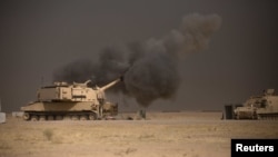 شلیک از یکی از تانک‌های آمریکایی به سوی موصل در پشتیبانی از نیروهای عراقی
