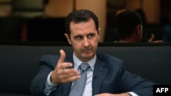 Президент Сирії Башар аль-Асад, 4 грудня 2014 року