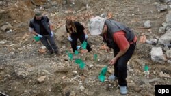 Iskopavanje masovne grobnice u mestu Rudnica kod Raške