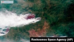 O imagine de satelit a incendiilor de pădure în regiunea Krasnoiarsk, în estul Siberiei, 21 iulie 2019