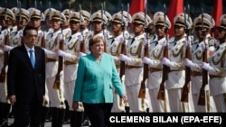 Cancelarul Angela Merkel și premierul chinez Li Keqiang, la Beijing, 6 septembrie 2019